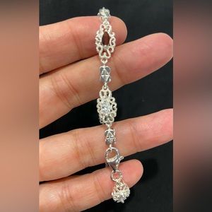 Cubic Zirconia, Red Stone, and silver plated bracelet